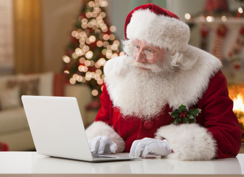 Santa using a laptop